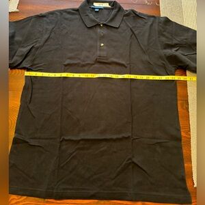 Men’s black polo golf shirt